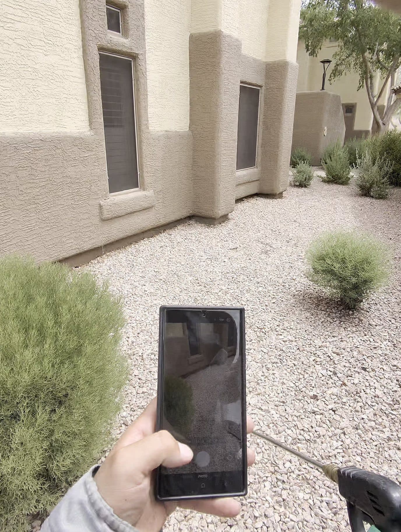 Stucco Phoenix home exterior with gravel landscaping