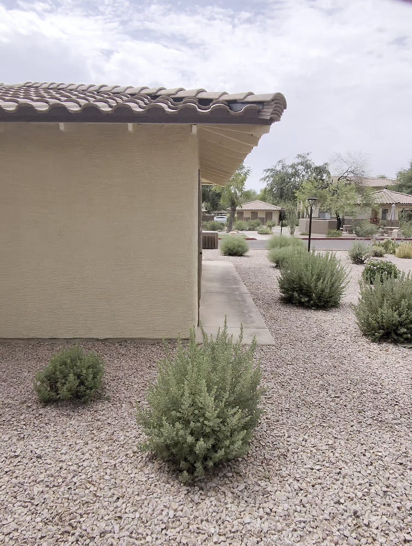 A tile-roof Phoenix Valley home with a desert yard